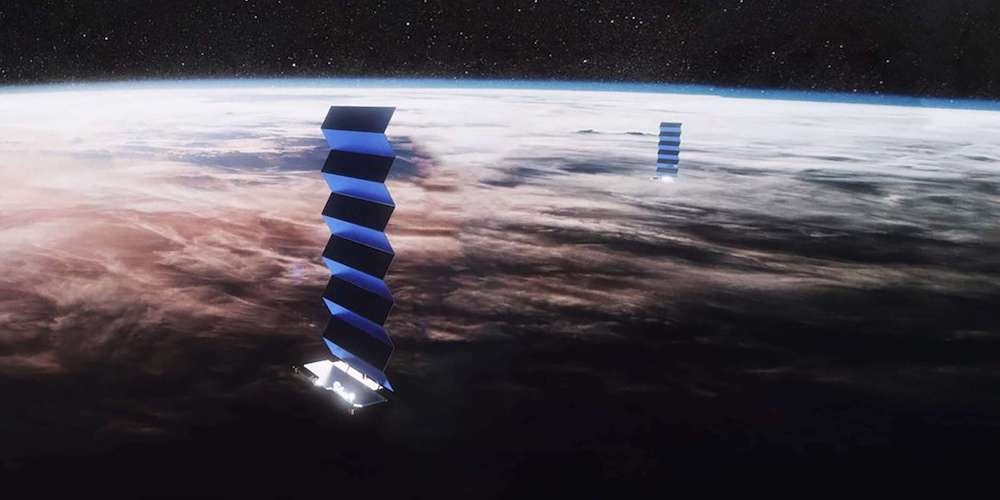 Artistieke impressie van Starlink satellieten in een lage baan om de aarde. 
