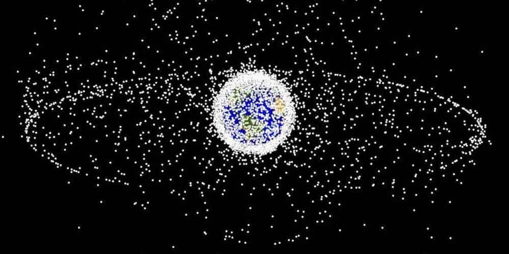 Artistieke impressie van satellieten en ruimtepuin in verschillende banen om de Aarde